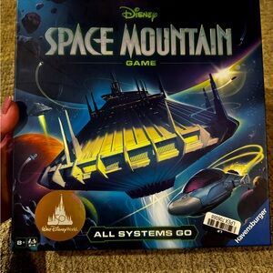 Disney’s Space Mountain game. Unopened.
